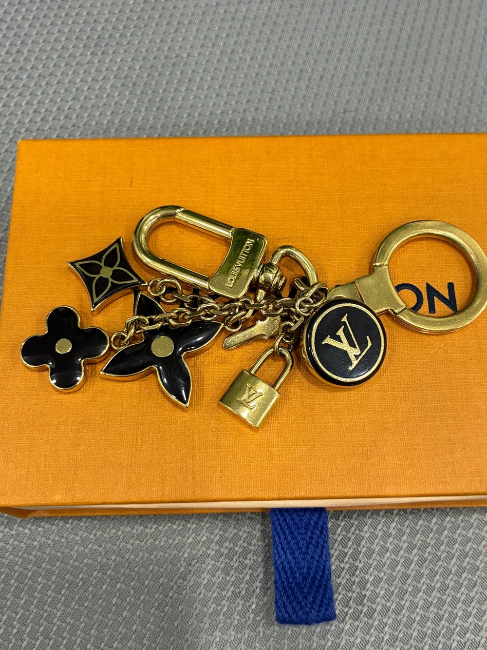 Authentic Louis Vuitton Fleur de Monogram Bag Charm Key HolderGold Keychain w/